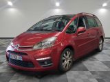 the red citrole is parked on a checkered floor