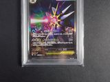 a close up of a pokemon card on a black surface