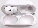 a pair of airpods sitting in a case on a table