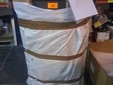 a stack of boxes on a pallet in a warehouse