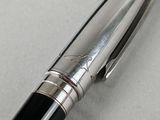a pen that is laying on a table