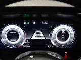 a close up view of a car ' s dashboard with various gauges
