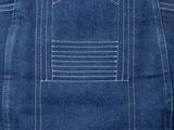 a close up of a pair of jeans with stitching on them