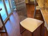 a chair that is sitting in front of a table
