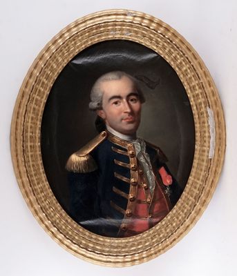 portrait of a man in a military uniform in a gold oval frame