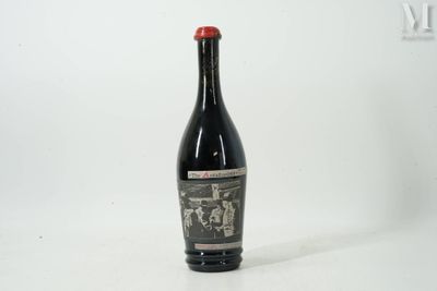 a bottle of wine that is sitting on a table
