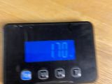 a digital clock that is on the table