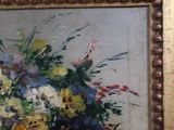 a painting of flowers in a vase on a table
