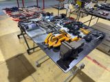 many different tools on a table in a room