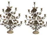 pair of antique iron candelabs with roses and leaves