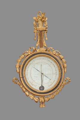 a clock that is hanging on the wall in the room