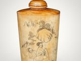 a vase with a drawing on it on a white background