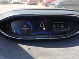 the dashboard of a car with a digital display in the center