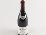 a bottle of wine that is sitting on a table