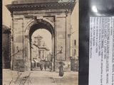 a picture of an old photo of an arch