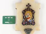 a picture of a wall clock with a picture of jesus on it
