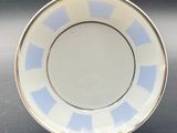 an image of a blue and white plate sitting on a table