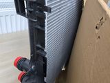 an image of a radiator and a box on a wooden floor