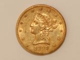 an image of a gold coin with a woman ' s head on it