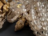 a bunch of crystal beads on a black surface