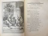 an open book with a picture of a man holding a sword