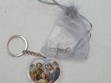 a picture of a keychain with a picture of jesus on it