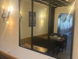 a large mirror on the wall of a restaurant