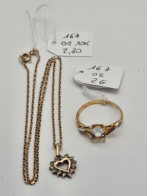 a group of jewelry including rings, necklaces, and a ring