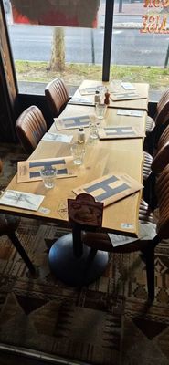 many chairs around a table in a restaurant