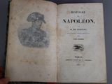 an open book with a picture of a man in a hat on it