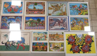 a lot of pictures on the wall of a building