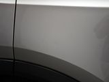 a close up of a car ' s door handle and door handle