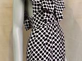 a mannequin mannequin with a black and white dress on a mannequin mannequin mannequin mannequin mannequin manne