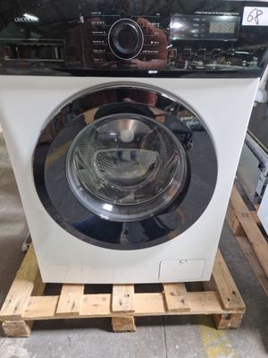 a washing machine that is sitting on a pallet