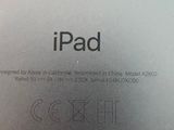 the back of an apple ipad with a white screen and a black keyboard