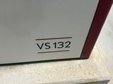 a picture of a white refrigerator with a red handle