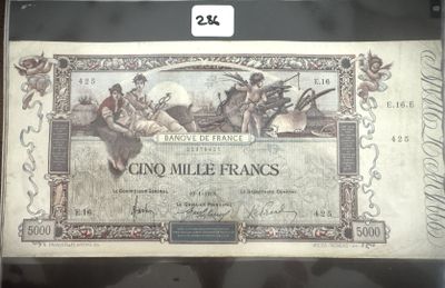 une photo d'un très vieux billet de banque sur lequel figure le portrait d'un homme