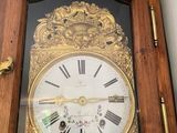 a clock that is on the wall in the room
