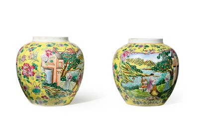 pair of yellow vases decorated with flowers and birds on a white background