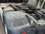a truck that is parked inside of a garage