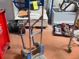 a small hand truck that is sitting on the floor
