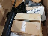 a cardboard box full of boxes and a blow dryer