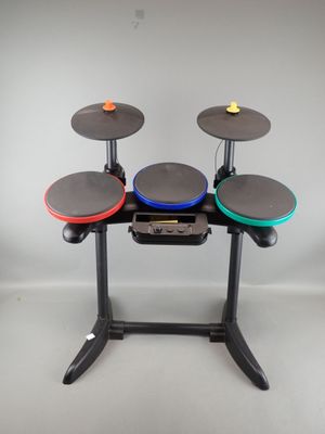 a drum set up on a stand in a room