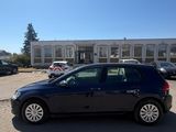 the car is parked in the parking lot outside of the building