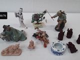 many figurines that are sitting on a table