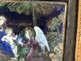 an image of a picture of a painting of an angel and a baby jesus