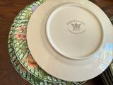 a plate with a crown on it sitting on a table