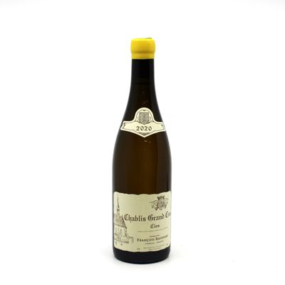 a bottle of wine that is sitting on a table