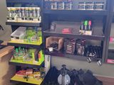 a counter with a lot of items on it in a store