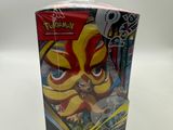 the box of the pokemon trading card game has a yellow and red face on it